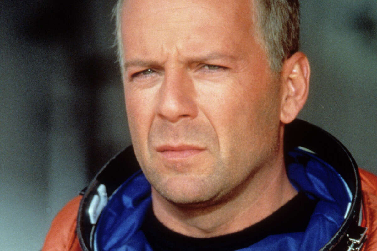 Bruce Willis en traje espacial en escena de la película 'Armageddon', 1998.