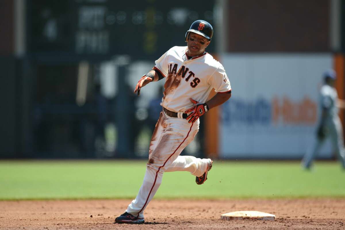 Dave Roberts, de los Gigantes de San Francisco, corre durante el partido contra los Dodgers de Los Ángeles en el AT&T Park de San Francisco el 10 de agosto de 2008. Los Gigantes derrotaron a los Dodgers 5-4.