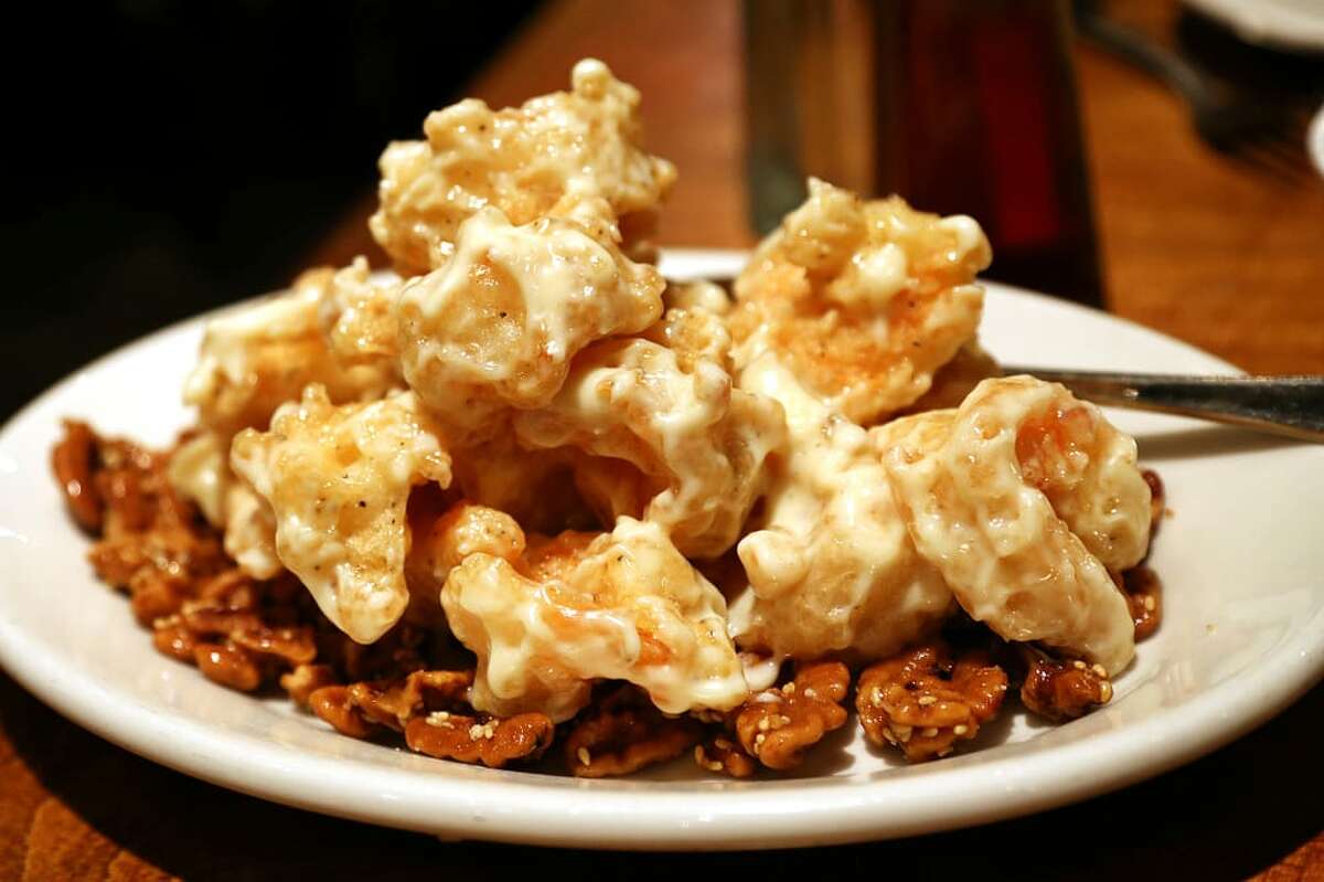 Langostinos con nueces y miel en Shen Hua.