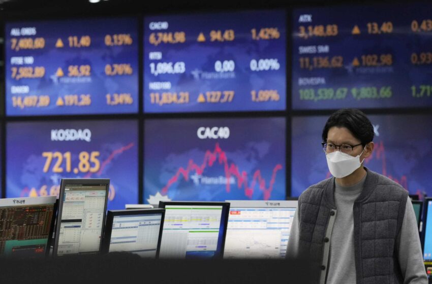  Las acciones asiáticas siguen las ganancias de Wall St tras unos datos de inflación más frescos